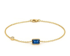 pulsera Veronica Hecht Oro Amarillo 18k con "1 Zafiro Laboratorio corte esmeralda de 6.5x4.5, Circón corte brillante"1 Zafiro Laboratorio corte esmeralda de 6.5x4.5, Circón corte brillante