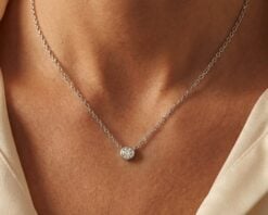Colgantes Oro Blanco 14k con 1 Diamante corte brillante de 12 pt