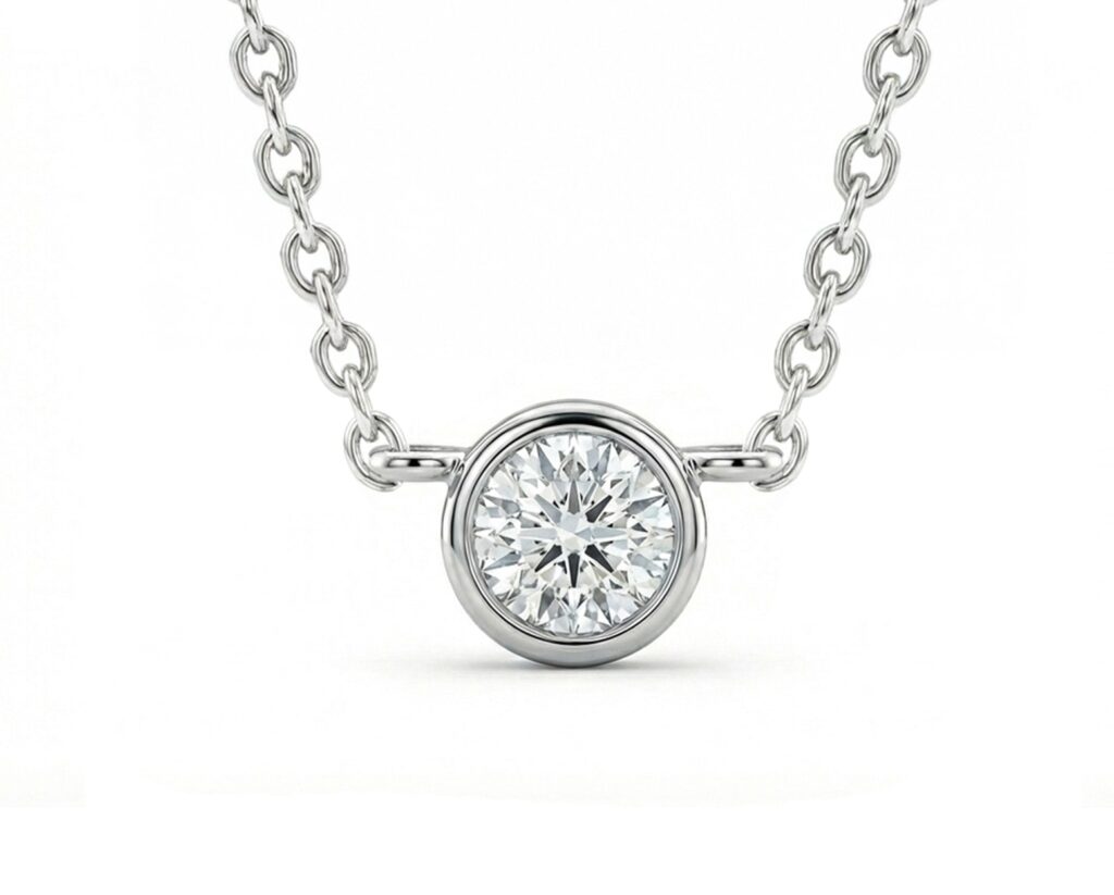 Colgantes Oro Blanco 14k con 1 Diamante corte brillante de 12 pt